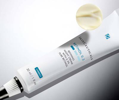 A collection of hair care products is displayed on one side, while the other side shows a person with long hair styled with a clip that spells "PARK."