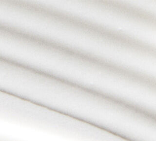 Smooth white surface with soft, flowing curves and subtle shadows.