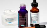 Trois produits de soin de la peau SkinCeuticals : creme hydratante, serum intensifiant H.A. et serum C E Ferulic.