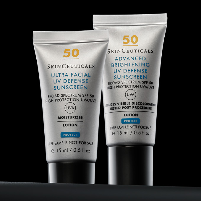 Zwei Hautpflegeprodukte von SkinCeuticals: C E Ferulic und HA Intensifier auf schwarzem Hintergrund.