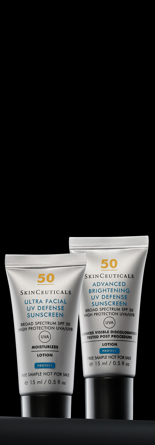Deux tubes de 15 ml des protections solaires SkinCeuticals SPF 50 sur fond noir : Ultra Facial UV Defense à gauche, Advanced Brightening UV Defense à droite.